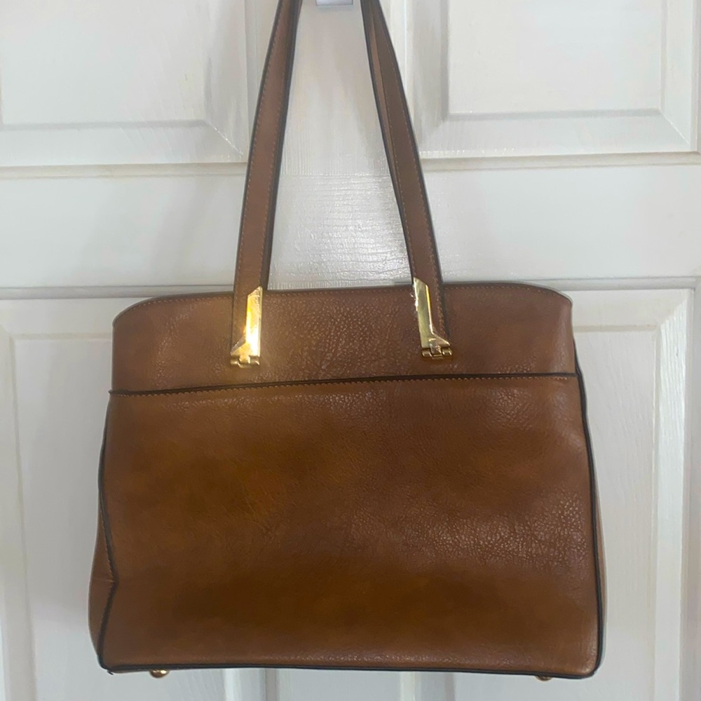 Seven Days Lifestyle & Dreams shoulder bag.